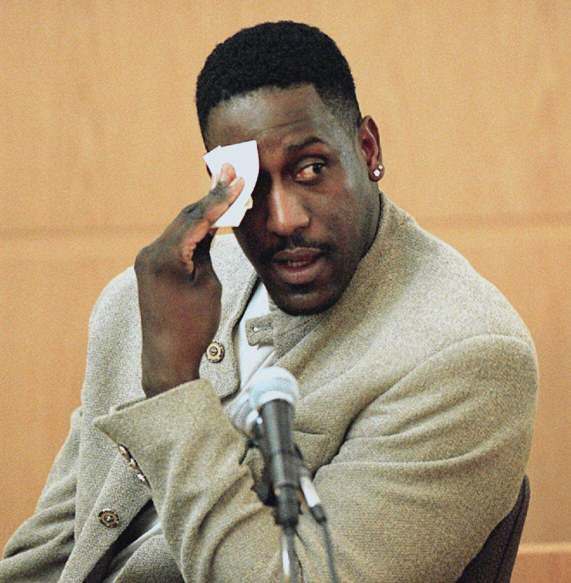 Former NBA basketball player Charles Shackleford wiped sweat from his brow during his testimony in the Rae Carruth trial. Shackleford, who once played  for N.C. State, corroborated the testimony of former Carruth girlfriend Candace Smith.