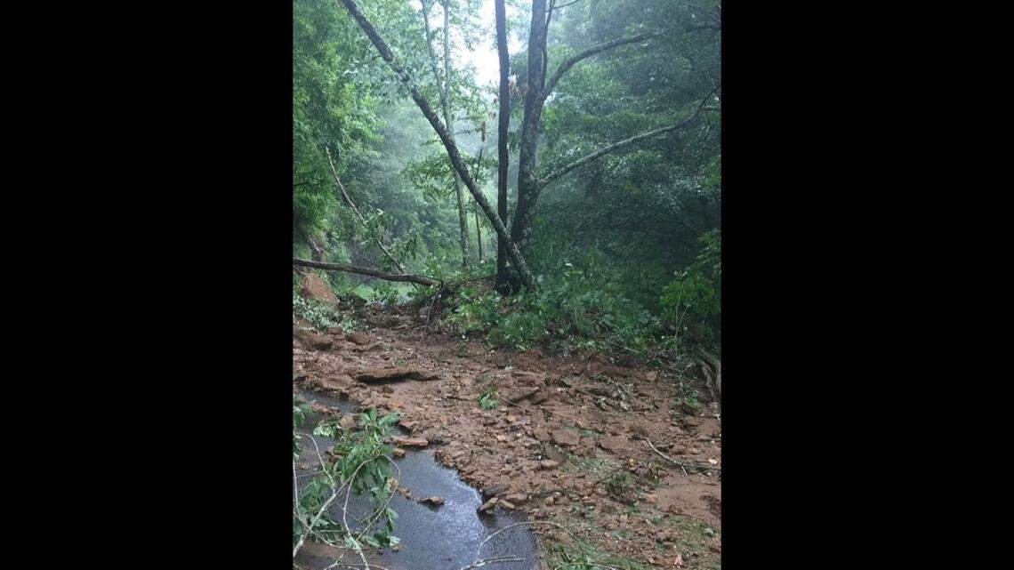 The Blue Ridge Parkway shared a photo on Facebook of a mudslide blocking pavement at Milepost 369.