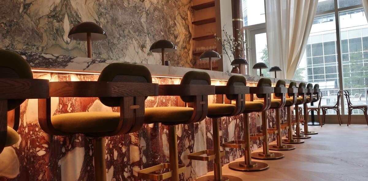Under bar lighting adds to the ambiance at Albertine in uptown Charlotte.