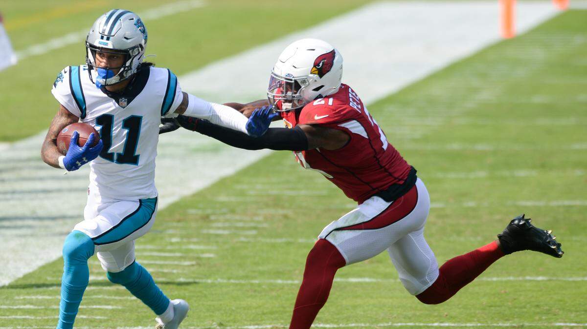 Arizona Cardinals cornerback Patrick Peterson (21) attempts to tackle Carolina Panthers wide receiver Robby Anderson (11) during the first quarter of their match up at Bank of America Stadium in Charlotte, NC on Sunday, October 4, 2020.