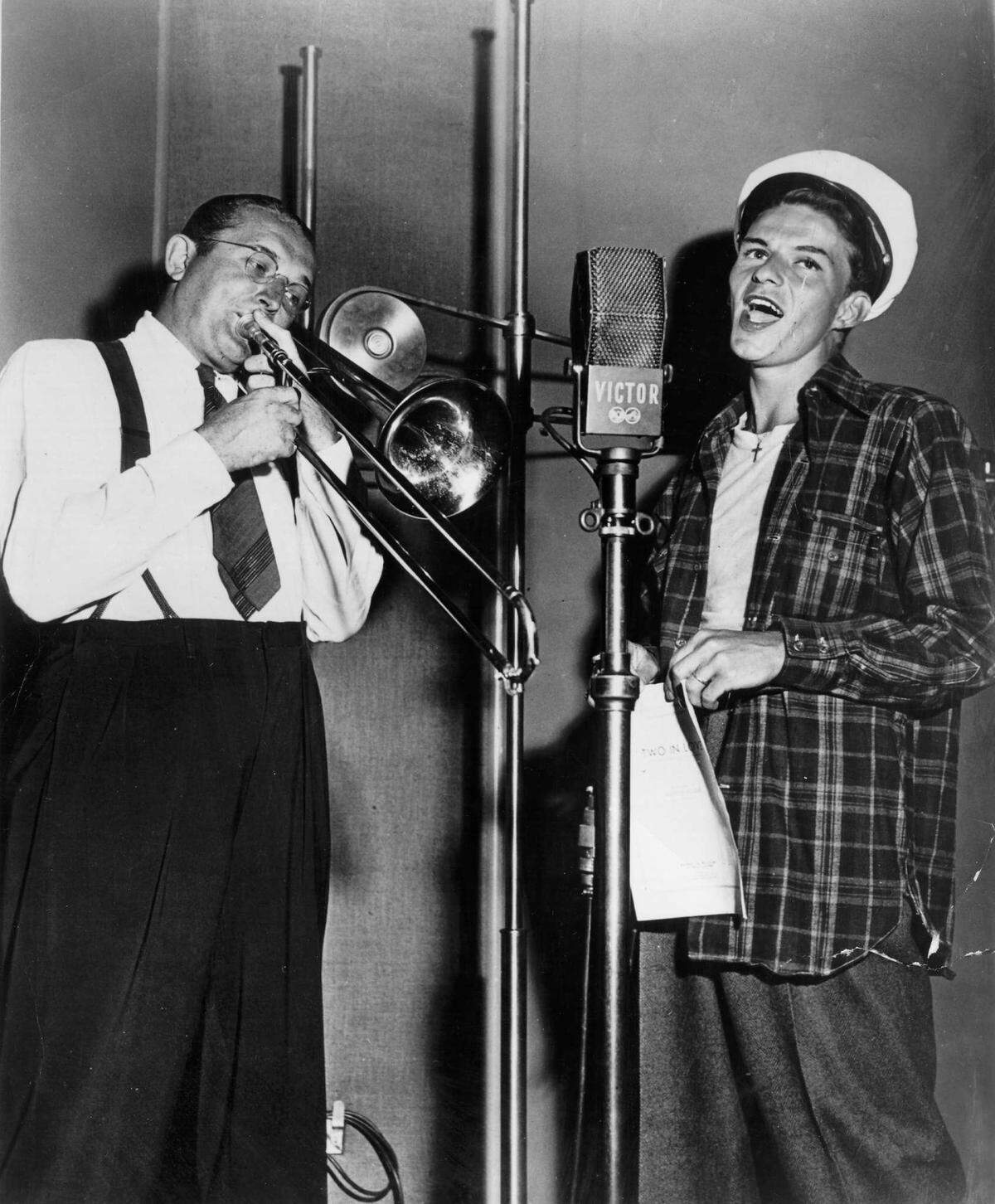 Frank Sinatra performs with bandleader Tommy Dorsey, left, in a circa 1940 photo. Dorsey was Sinatra’s early mentor until he left the band in 1942 to start a solo career. Dorsey and Sinatra were among the many performers who played Carolina Theatre in Charlotte over the years.