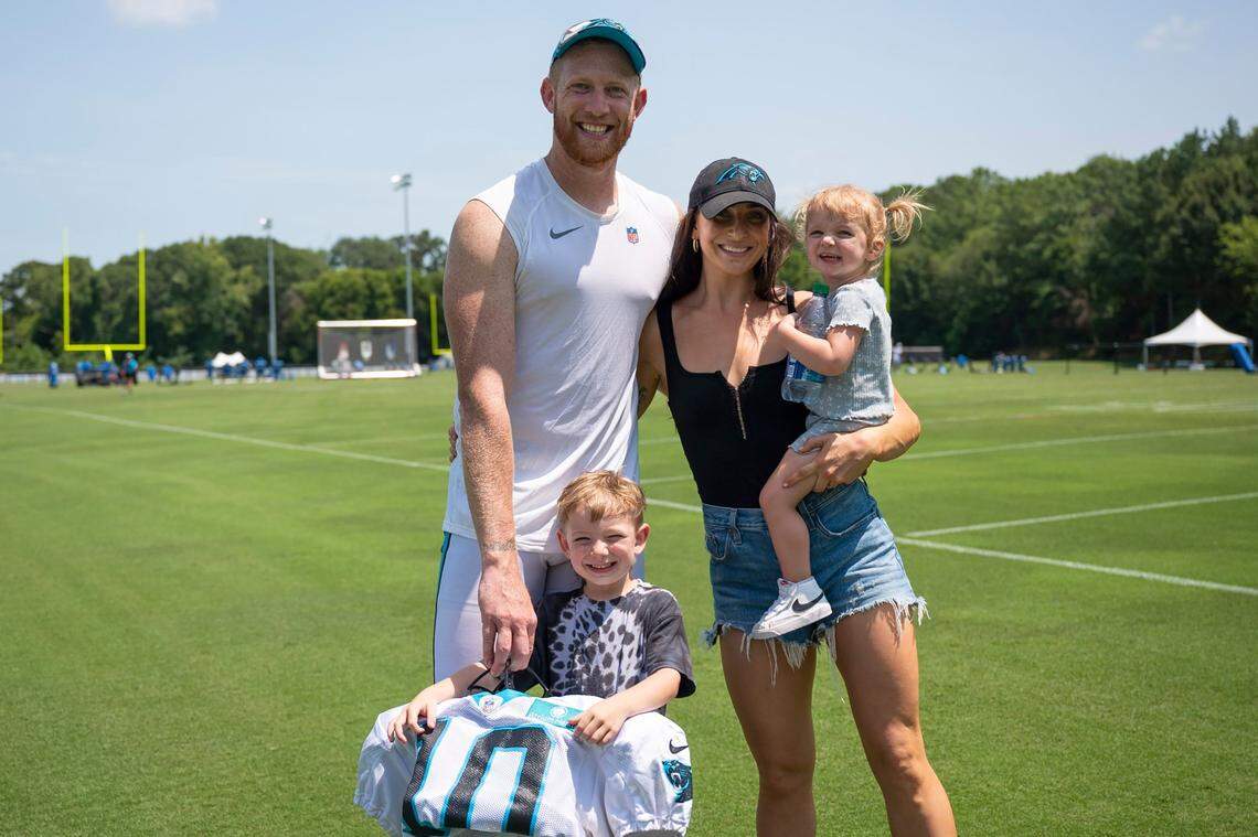 Panthers punter Johnny Hekker poses for a photo with his wife, Makayla, and their two children, Jett, 4, (standing) and Maya, 1, after practice at training camp on Tuesday, August 2, 2022, in Spartanburg, SC.