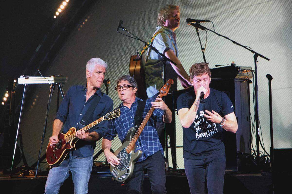 Kyle Cook, Brian Yale and Rob Thomas of Matchbox Twenty at PNC Music Pavilion on Tuesday night.