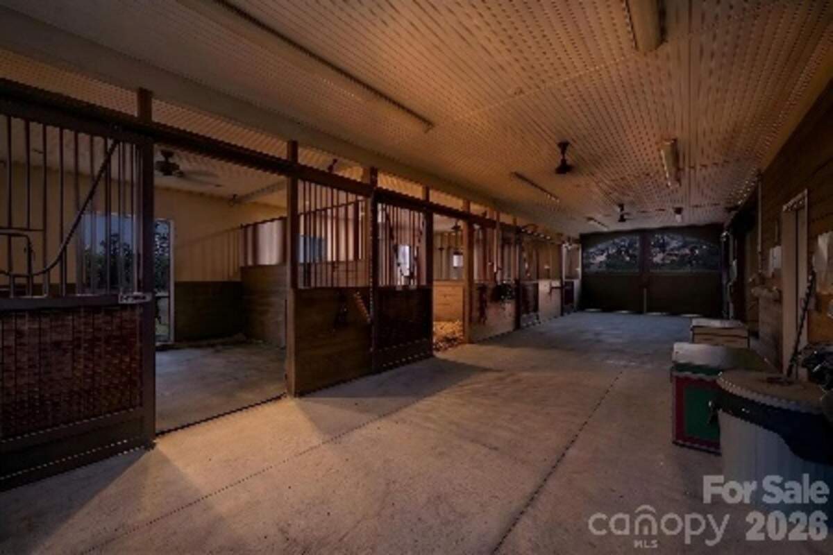 This professionally designed horse barn on the mansion grounds accommodates eight horses.