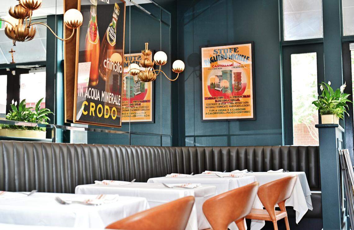 The deep blue color for the walls was chosen to evoke a warm, intimate feel to match the food.