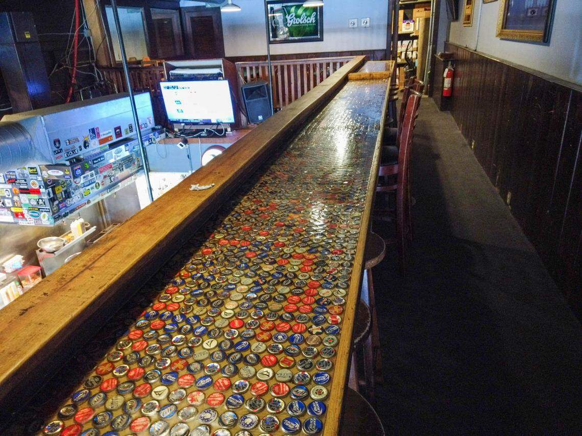 Comet Grill’s bar is filled with bottle caps.