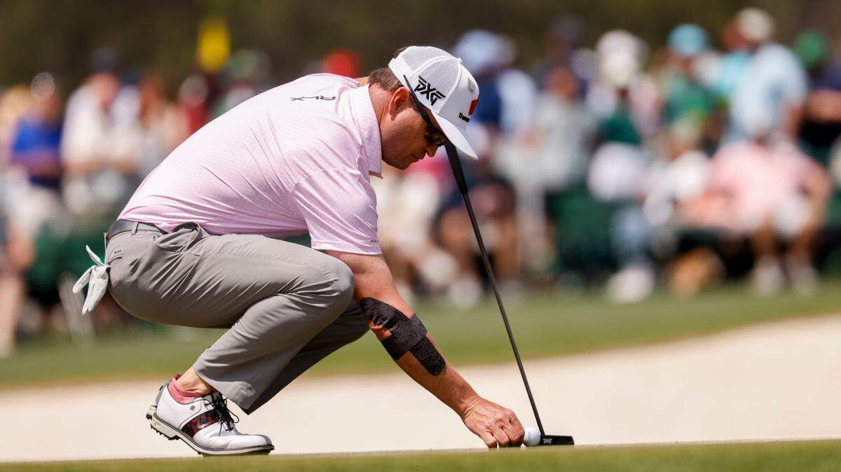 Zach Johnson lines up his putt Saturday on No. 17 during the third round of the Masters Tournament at Augusta National Golf Club.
