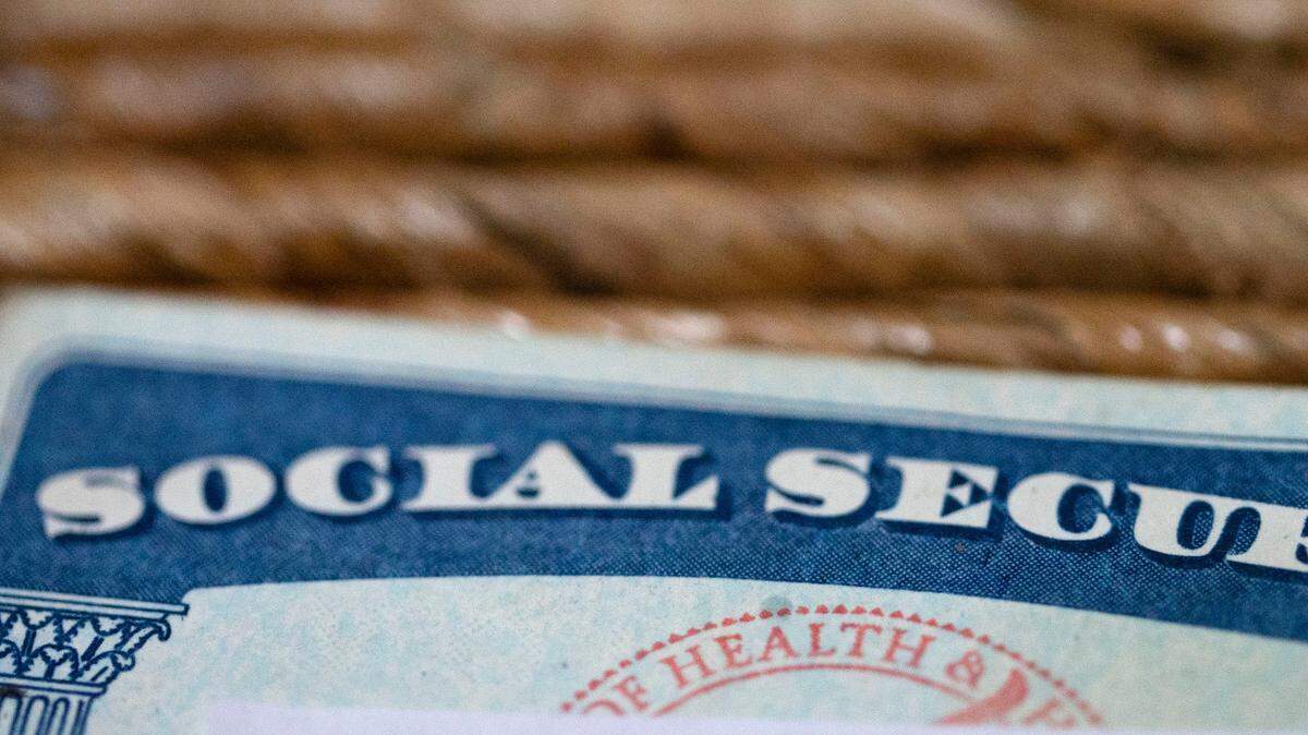 This Tuesday, Oct. 12, 2021, photo shows a Social Security card in Tigard, Ore. Millions of retirees on Social Security will get a 5.9% boost in benefits for 2022. The biggest cost-of-living adjustment in 39 years follows a burst in inflation as the economy struggles to shake off the drag of the coronavirus pandemic. (AP Photo/Jenny Kane)