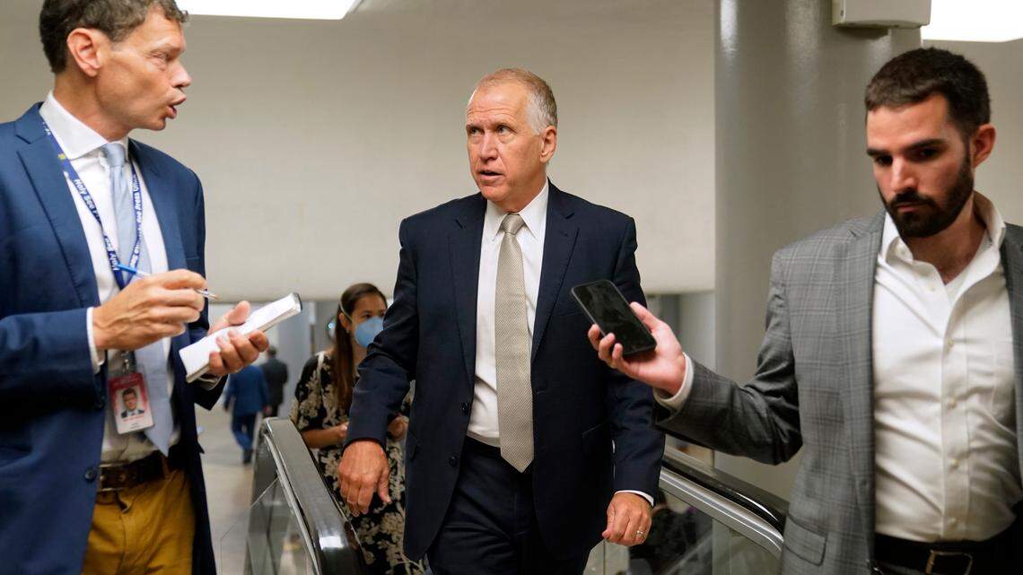 Sen. Thom Tillis, R-N.C., center, speaks with reporters on Capitol Hill in Washington on June 9, 2022.