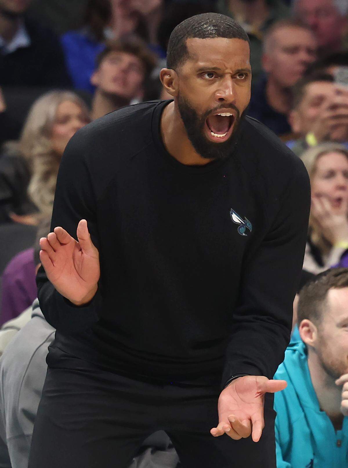 Charlotte Hornets head coach Charles Lee yells instructions to his team during action against the Los Angeles Lakers on Monday at Spectrum Center. The Lakers defeated the Hornets 121-111.