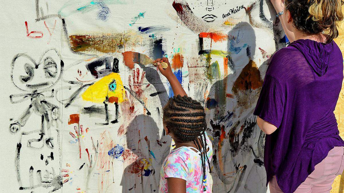 Zaria Campbell, left, and Ava Haire work on a mural, one of many displayed at this weekend's BOOM festival in Plaza Midwood. The BOOM festival is Charlotte's annual showcase of contemporary and experimental art created on the fringes of popular culture, featuring a unique coalition of artists, volunteers, nonprofits, local businesses and neighborhood organizations to transform the way art is made and shared in the Queen City. Tickets are $10 and many events are free admission at the event in Plaza Midwood the weekend of April 20-22, 2018. Free events and family activities centered around the stage at 1920 Commonwealth Ave., featuring public art installations and participatory visual art and games, pop up performances, live music, spoken word and dance performances. 