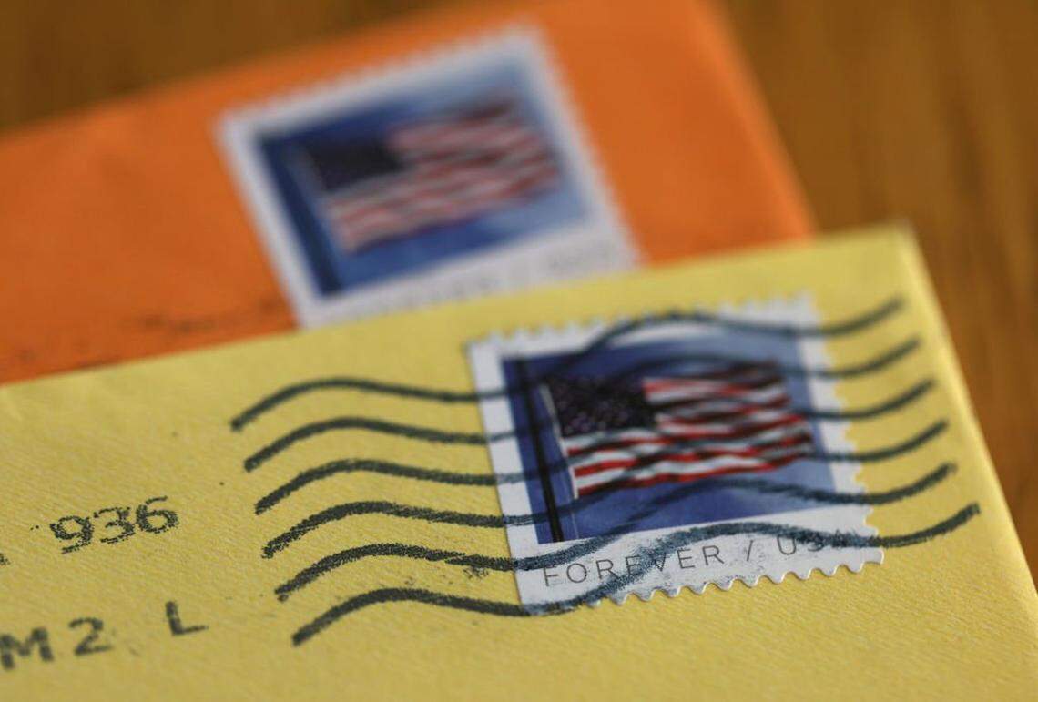 SAN ANSELMO, CALIFORNIA - APRIL 11: In this photo illustration, U.S. Postal Service (USPS) forever stamps are seen on envelopes on April 11, 2023 in San Anselmo, California. The USPS is raising the price of a first-class stamp from 63 cents to 66 cents, up 32 percent since 2019 when the price of a stamp was 50 cents. The price increase is set to take effect on July 9 pending approval by the postal regulator. (Photo Illustration by Justin Sullivan/Getty Images)