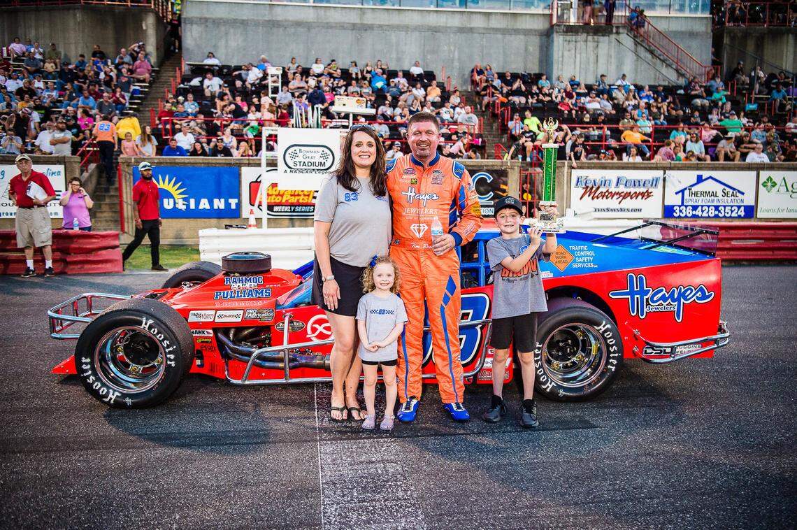Tim Brown and his family celebrate at Bowman Gray Stadium after Modifieds race win. Brown loves celebrating with his family: his wife, Megan; his daughter, Marley; and his son, Cam.