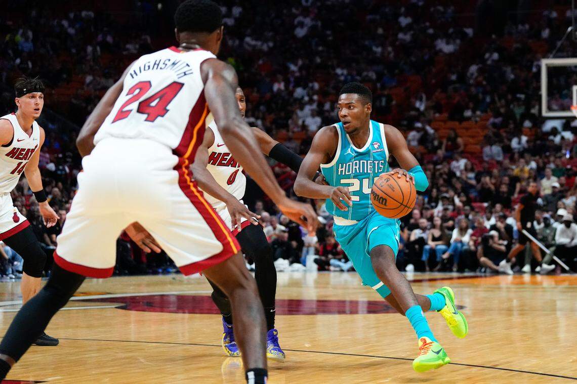 Charlotte Hornets forward Brandon Miller (24) drives to the basket against the Miami Heat during the second quarter at Kaseya Center on Tuesday night.