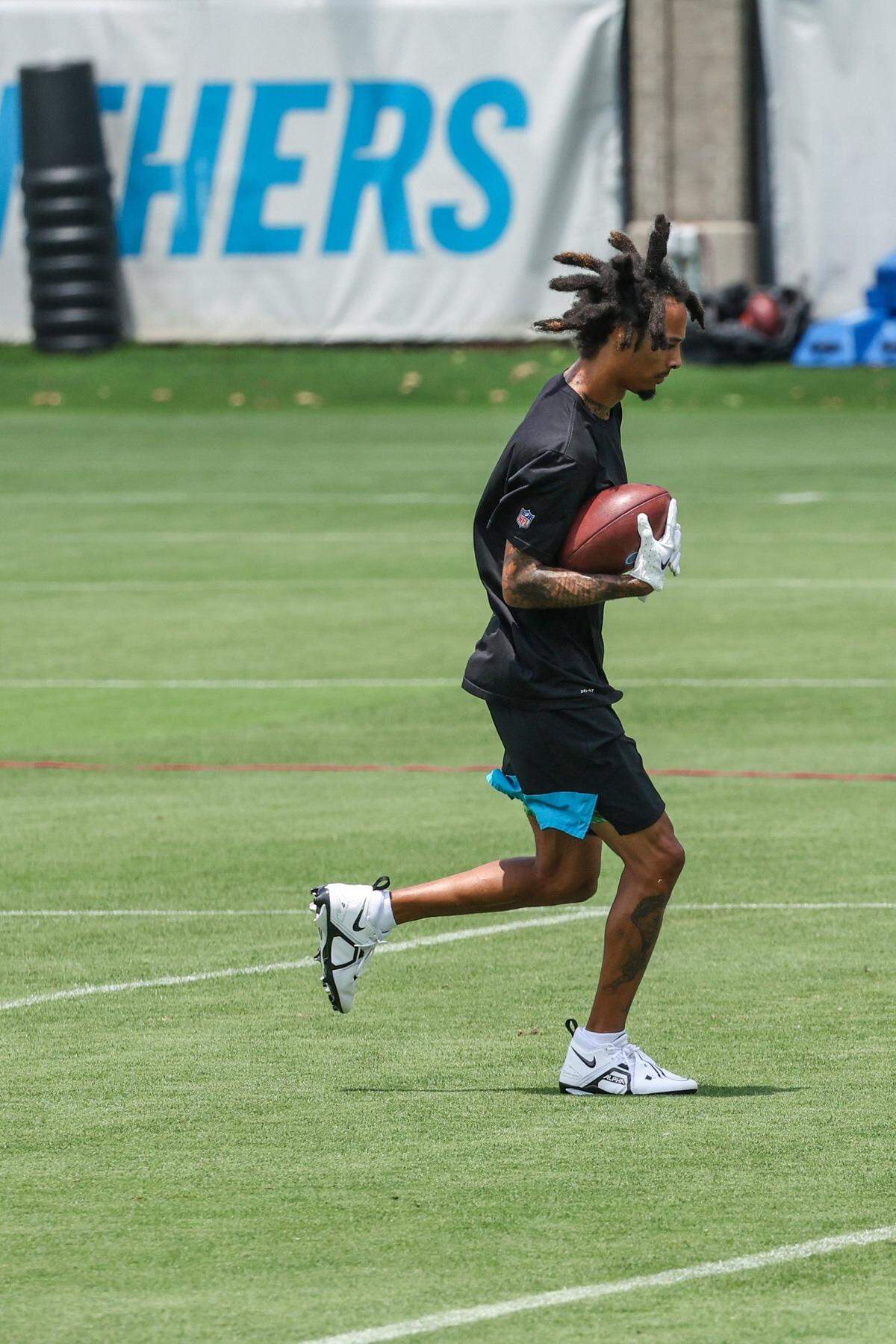 Panthers wide receiver Robbie Anderson works to the side during position drills on day two of mini camp on Wednesday, June 15, 2022 in Charlotte, NC.