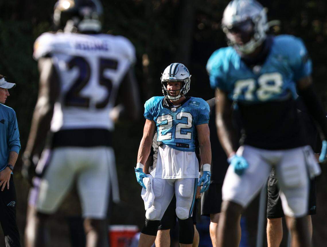 Carolina Panthers Christian McCaffrey watches a play during the joint practice with the Baltimore Ravens in Spartanburg, S.C., on Thursday, August 19, 2021.