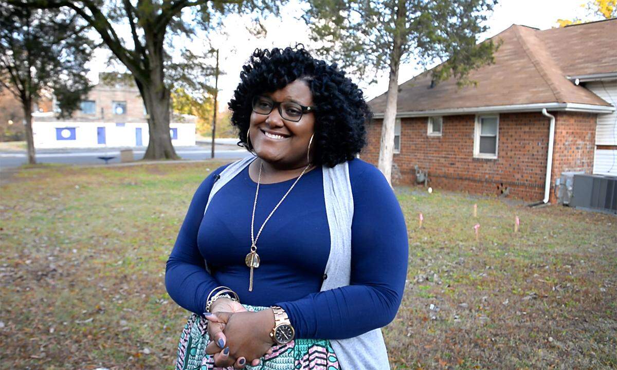 Charis Blackmon, executive director of the West Side Community Land Trust, stands on the lot that will soon be the site of the organization’s first house. The nonprofit wants to offer affordable homeownership in west Charlotte. They celebrated a groundbreaking at the site on Friday, Nov. 22., 2019.