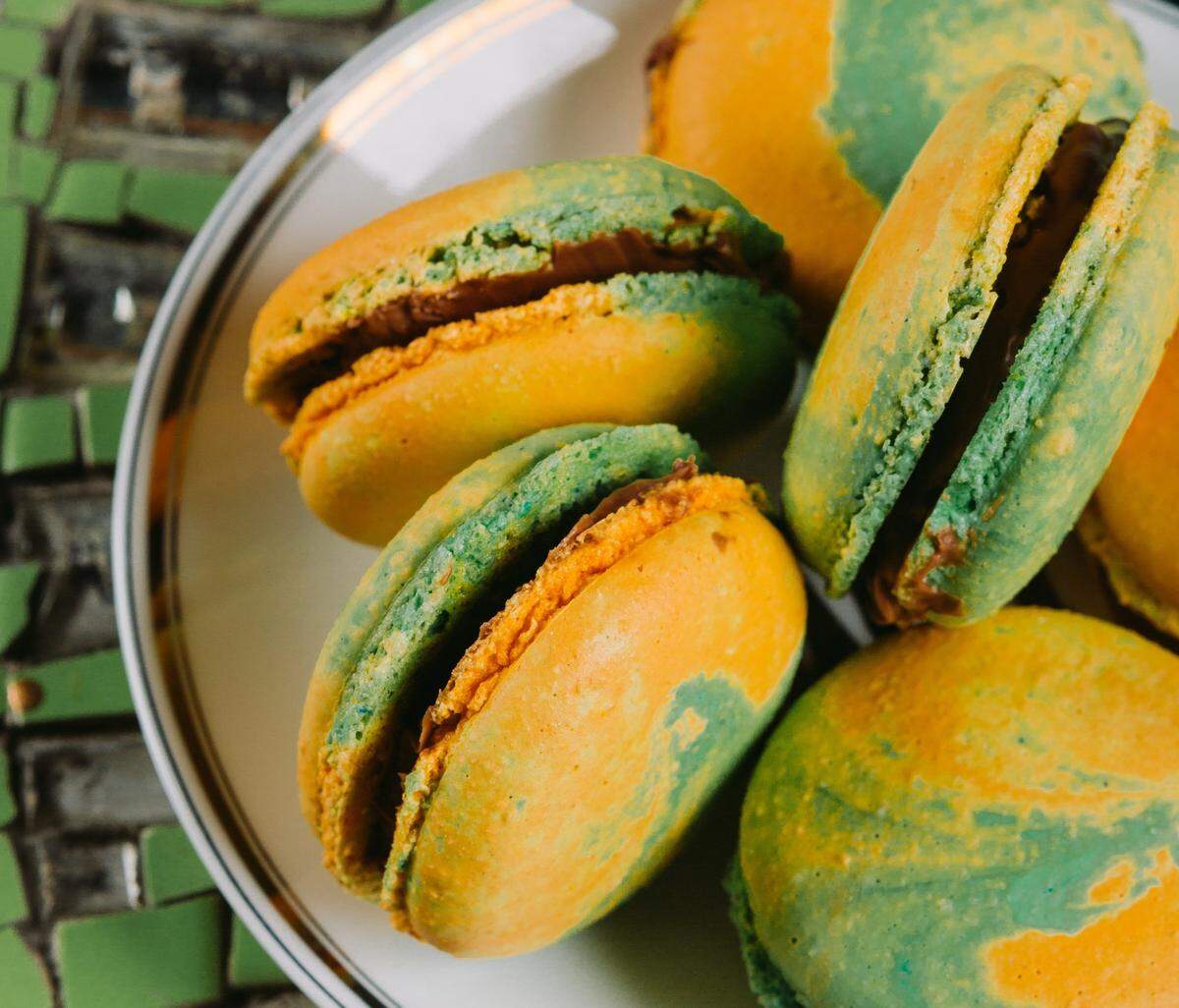 Amelie’s French Bakery will offer three themed macaron flavors, including Irish coffee, dark chocolate butterscotch and marshmallow lemon meringue.