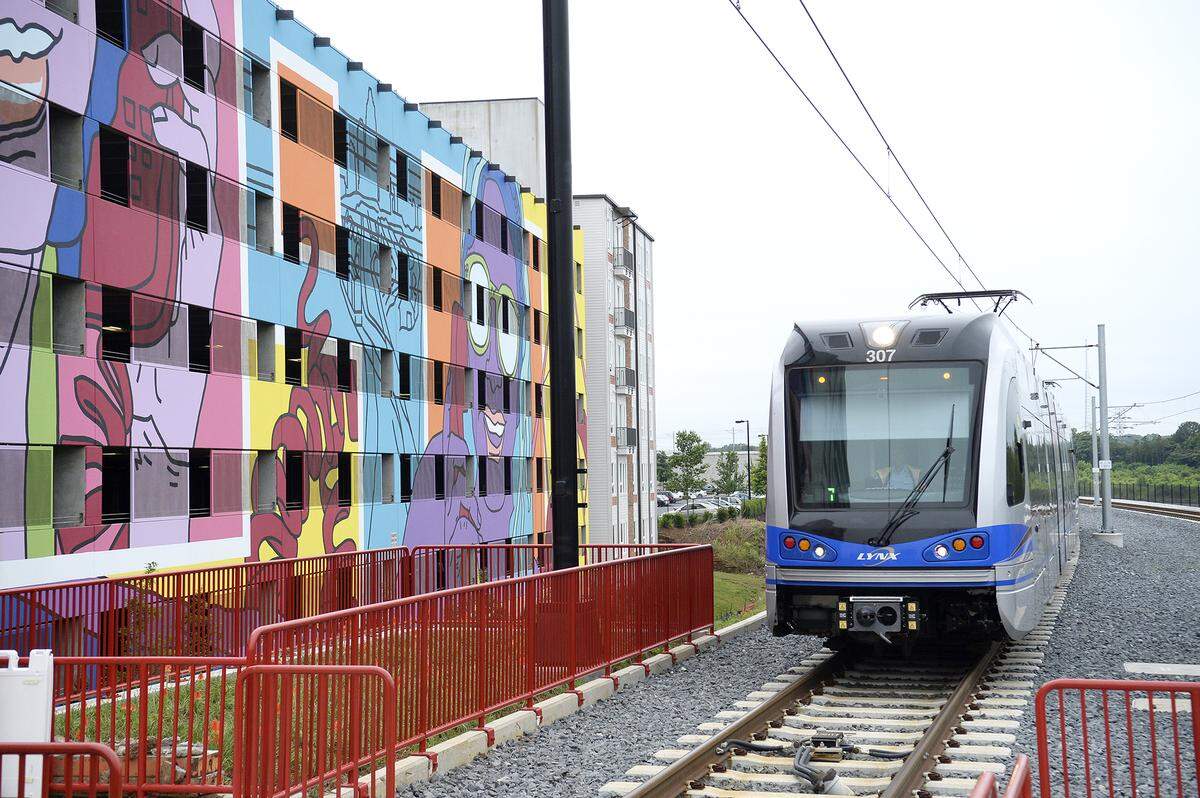 The Novel NoDa apartments on the light rail line include a large mural and an emphasis on local artists.