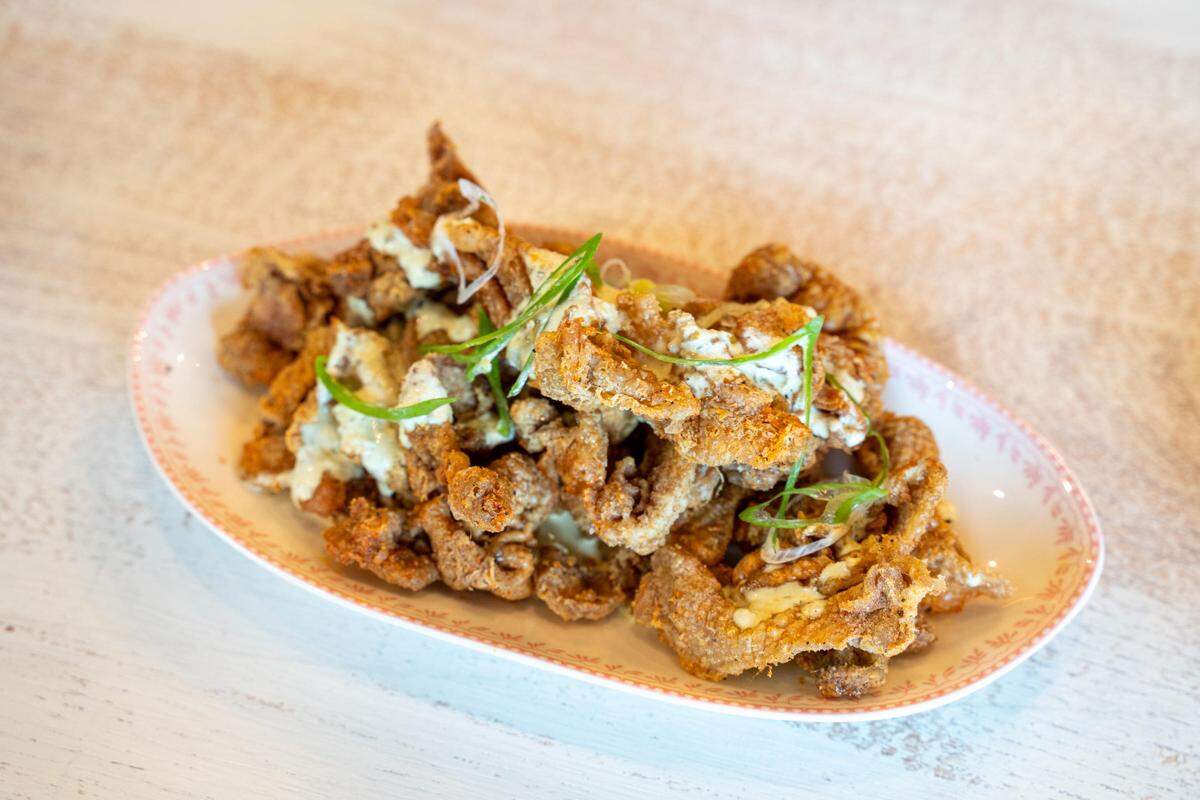 Leah & Louise River Chips are chicken skins with granch: a ranch and green onion sauce.