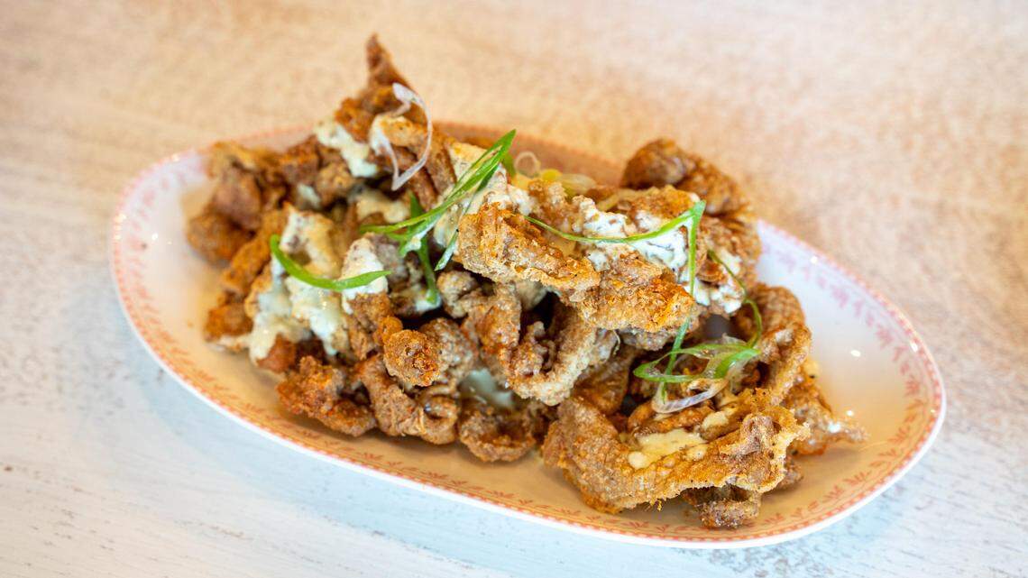 Leah & Louise River Chips are chicken skins with granch: a ranch and green onion sauce. Leah & Louise was named one of the best in the country by Esquire magazine.