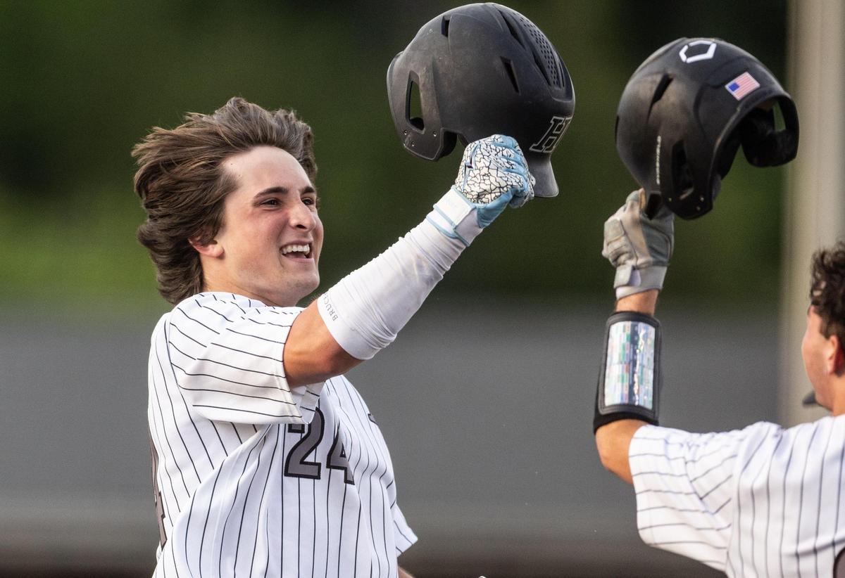 Hough Huskies Jaxon Matthews celebrates a home run against the Hopewell Titans at William Amos Hough High School in Cornelius, N.C., on Wednesday, April 30, 2025.