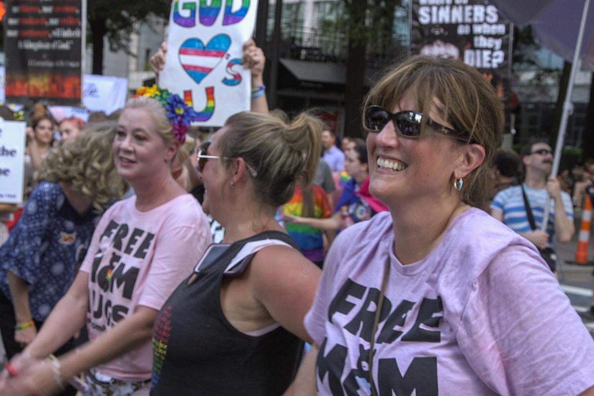 A group of mothers offered free hugs to people who went to the Pride Festival and supported the LGBT community in uptown Charlotte on Saturday, August 17, 2019.
