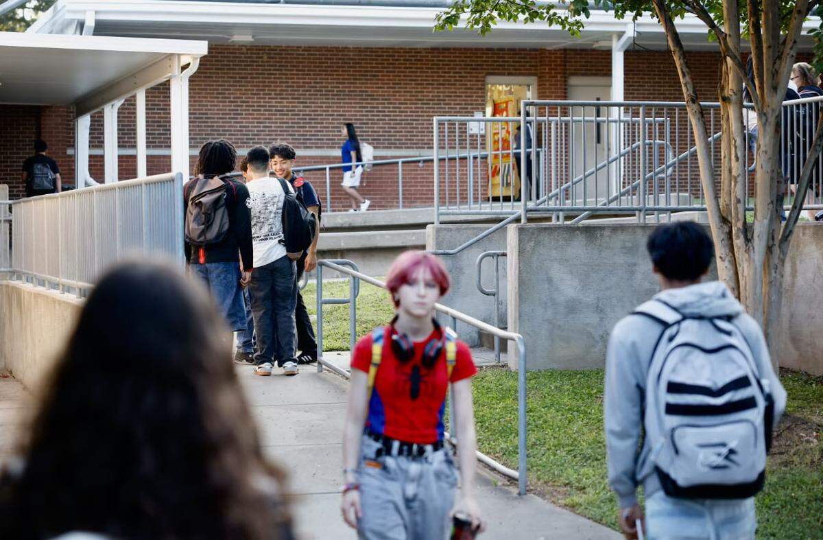 Students walk between classes at Hawthorne Academy of Health Sciences during the first day on Monday, August 26, 2024
