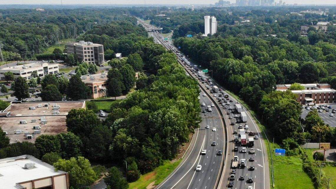 Drivers travel Interstate 77 near Arrowood Road in Charlotte, N.C., in July 2022. State and regional highway planners rejected an unsolicited proposal by Spain-based road-building giant Cintra to construct and manage Interstate 77 toll lanes from Charlotte to South Carolina.