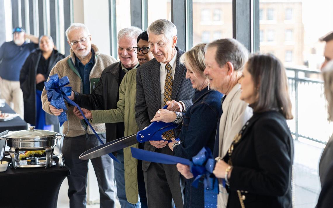 Concord city leaders celebrate the opening of Novi Lofts in downtown, the last of three new mid-rise and mixed-use buildings.