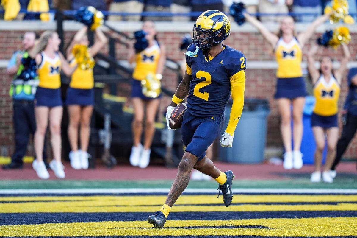 JACKSONVILLE JAGUARS: Michigan defensive back Will Johnson celebrates a touchdown after intercepting USC quarterback Miller Moss during the second half at Michigan Stadium in Ann Arbor on Saturday, Sept. 21, 2024.
