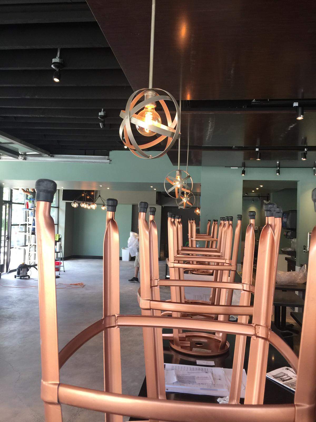 To separate the cocktail and sushi bars, Yume Bistro will feature two styles of chairs, including copper-colored chairs at the cocktail bar.