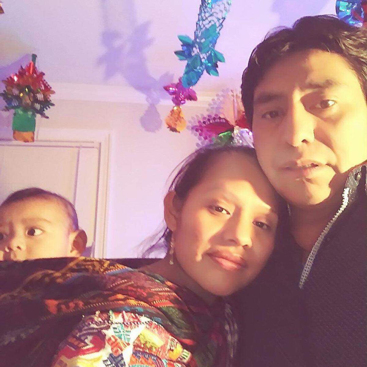 Ana Sanchez, center, alongside husband Clementino Mendez Domingo and 3-month-old baby Axel.