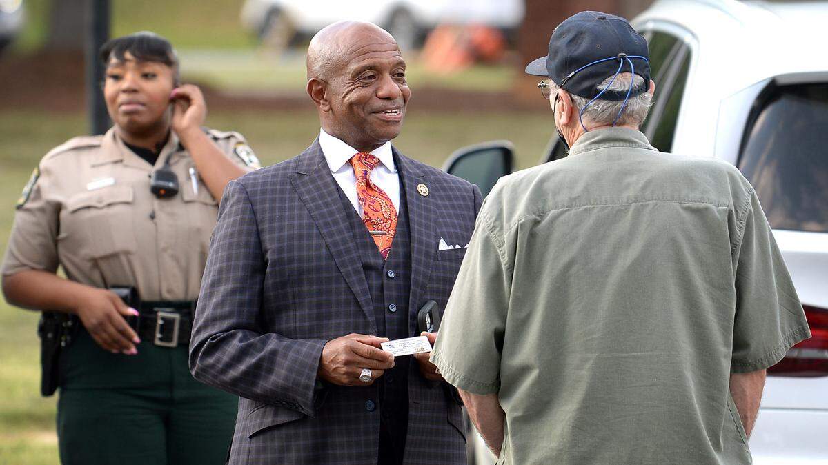 Mecklenburg County Sheriff Garry McFadden, center, spoke at the Unity in Community rally in 2021.