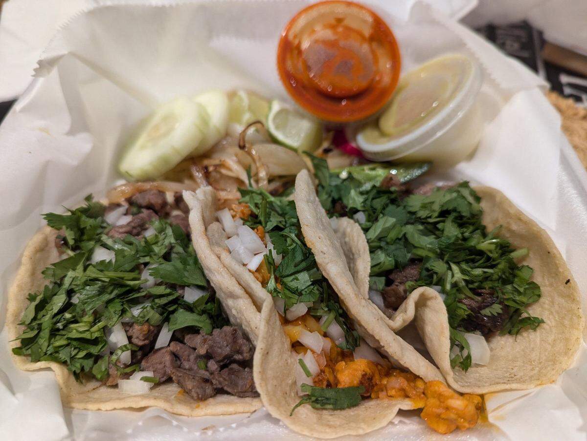 Cabeza (pork cheek), asada (beef) and pastor (pork shoulder) tacos from El Mercadito Food Truck.