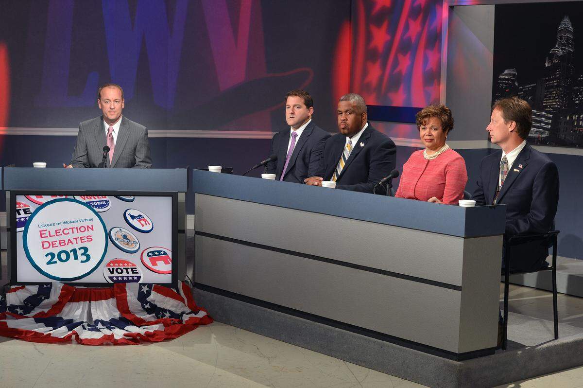 Moderator, Shawn Flynn,left, News 14 Managing editor Candidates:(L to R) Ken Harris, David Howard Vi Alexander Lyles and Dennis Peterson.Charlotte-Mecklenburg candidates face-off today at WTVI in a forum sponsored the League of Women Voters.T.Ortega Gaines - ogaines@charlotteobserver.com