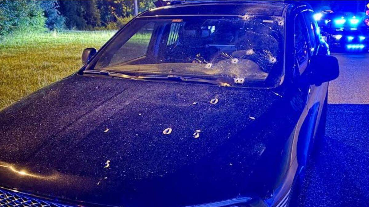 A Monroe police patrol car is shown riddled with bullets after an officer was shot multiple times during a pursuit on Saturday, May 31, 2025. Police said they fatally shot a suspect after “an extensive manhunt.”