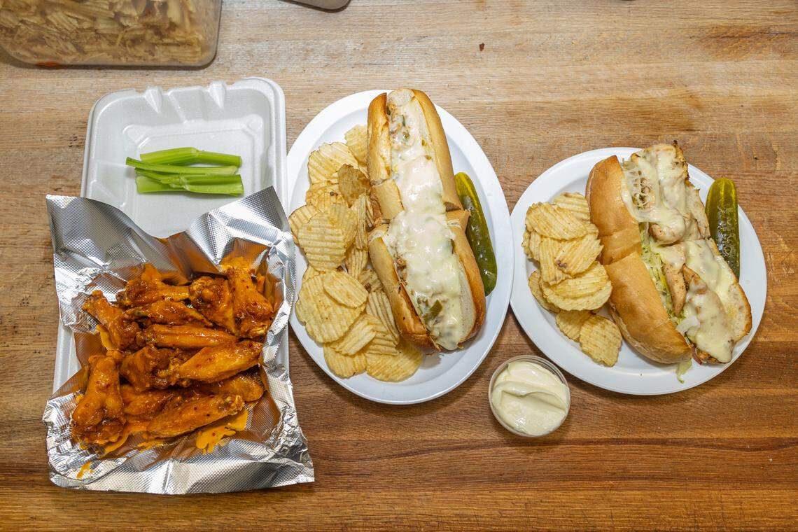 House of Pizza menu items include wings, a chicken Philly sub and a chicken strip club.