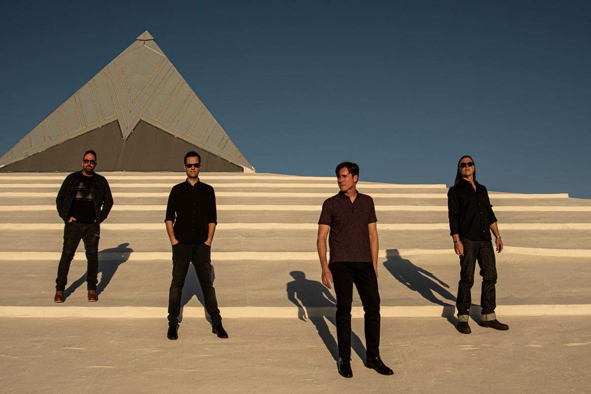 Jim Adkins, second from right, with Jimmy Eat World.