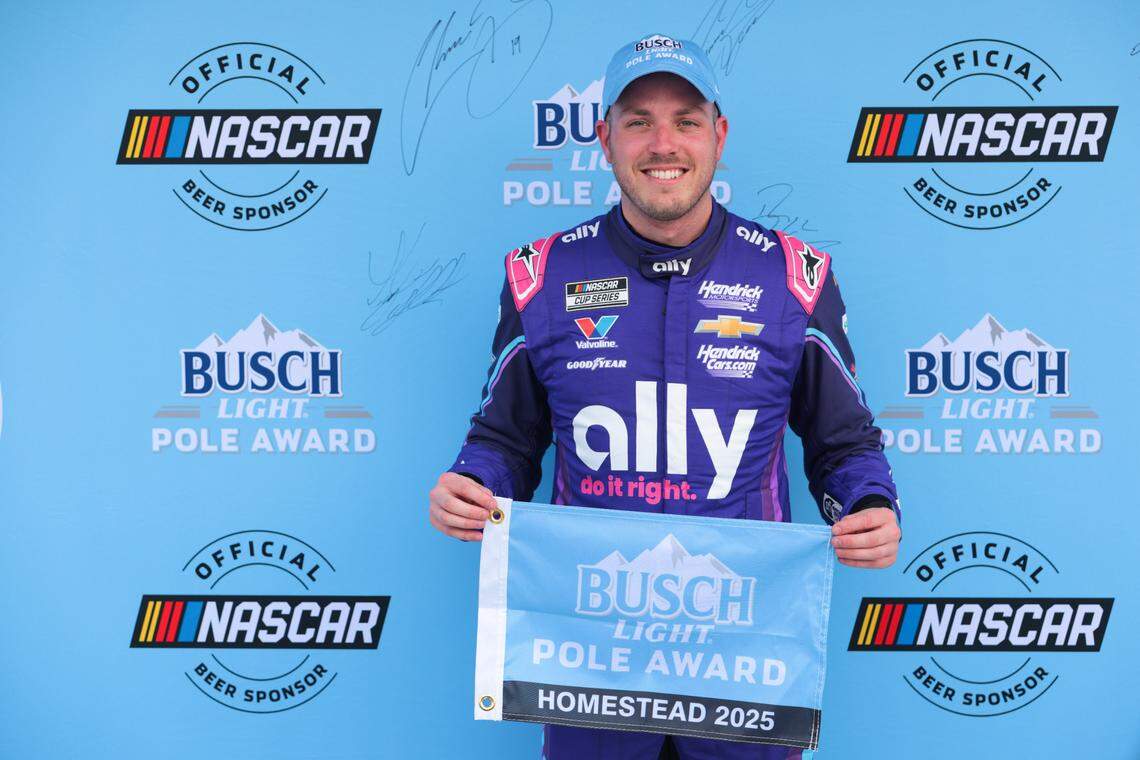 Mar 22, 2025; Homestead, Florida, USA; NASCAR Cup Series driver Alex Bowman (48) celebrates with Busch Light Pole Award after winning the pole for the the Straight Talk Wireless 400 at Homestead-Miami Speedway.