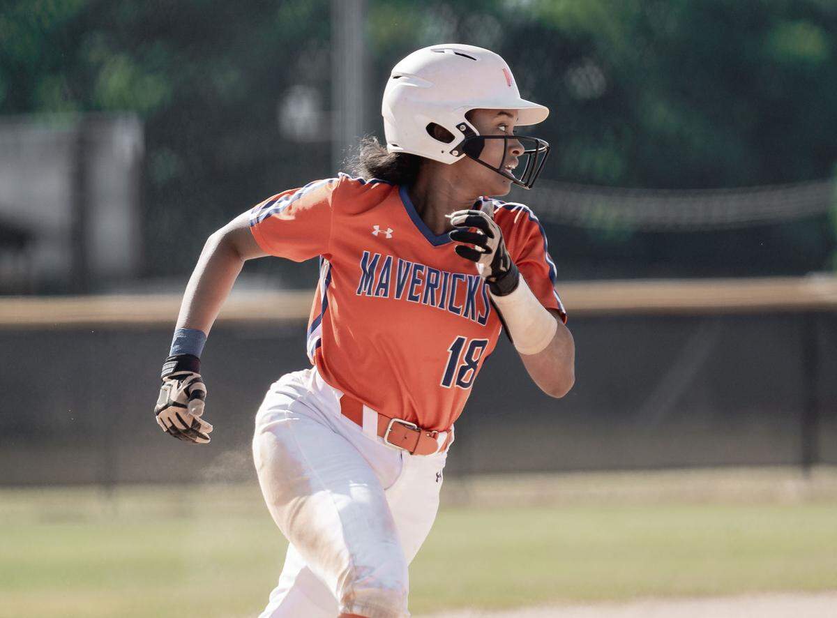 Marvin Ridge Mauri Murry (18) rounds third base and scores a run. South Meck would host Marvin Ridge in the 4th round Women’s Softball high school playoffs Friday May 20, 2022.