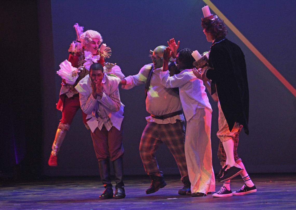 Lance Toppin, second from left, and fellow Best Actor nominees at the Blumey Awards react when Toppin is named the winner of that category Sunday night.