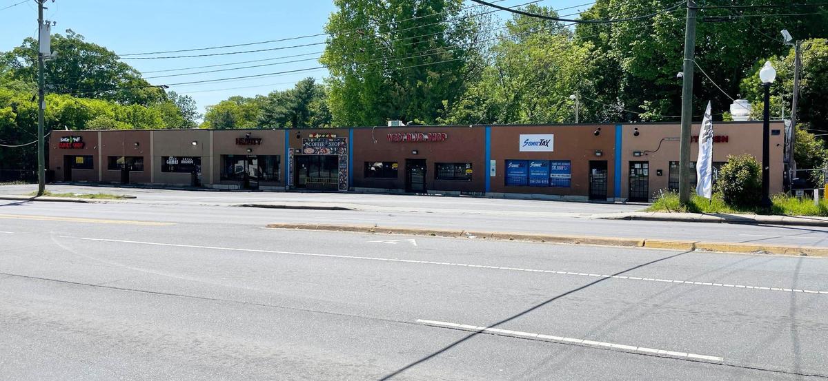 This strip mall near the intersection of West Boulevard and Remount Road in Charlotte, shown on Tuesday, April 27, 2021, could become federal property. In a forfeiture complaint filed in Charlotte, prosecutors say the eight-shop, commercial site is a brazen threat to public safety at one of the westside’s most prominent intersections.