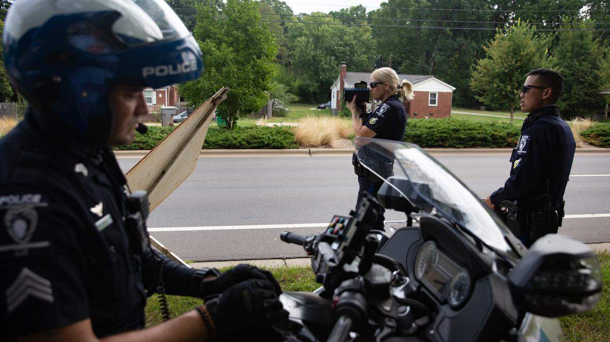 Drivers can go to the Mecklenburg County Courthouse again and try to negotiate speeding and other ​traffic violations. In this 2020 file photo, authorities look to catch speeders on Freedom Drive in Charlotte.
