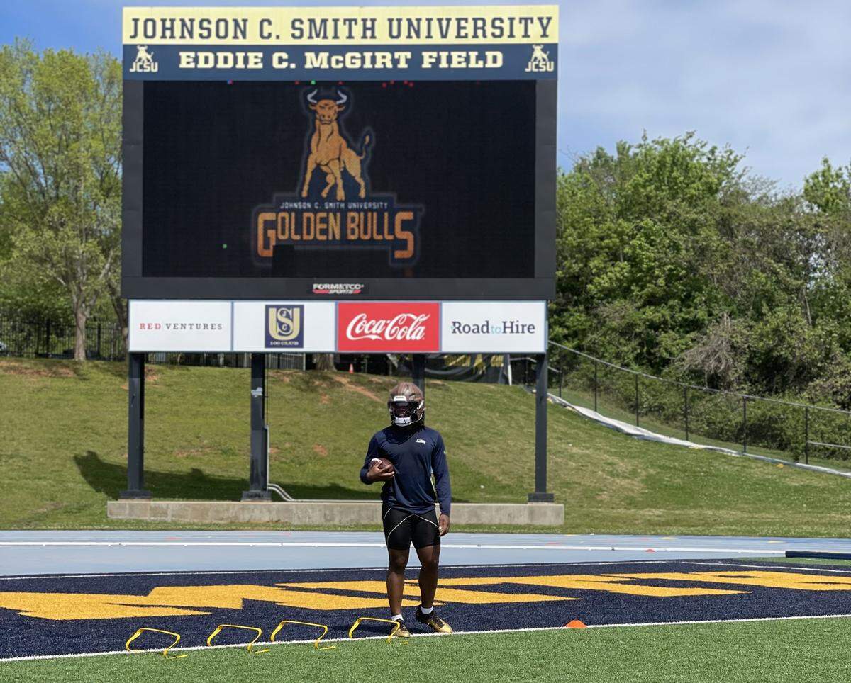 Emanuel Wilson plays for the Seattle Seahawks. But on Tuesday, the Charlottean was out on the Johnson C. Smith turf, completing a workout with his trainer and lifelong friend, Malik Brown.