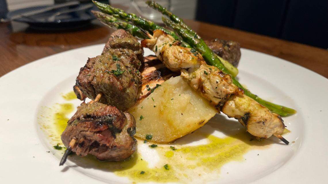 The mixed grill at Yassou Grill is lamb, chicken and filet with roasted vegetables.