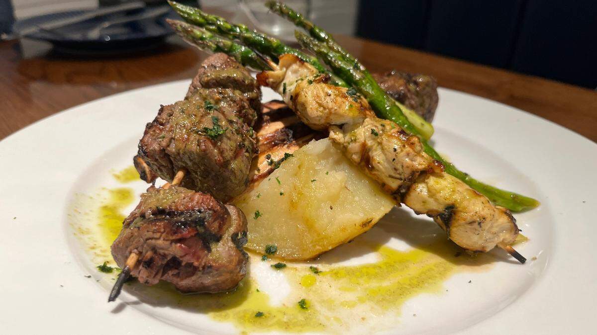 The mixed grill at Yassou Grill is lamb, chicken and filet with roasted vegetables.