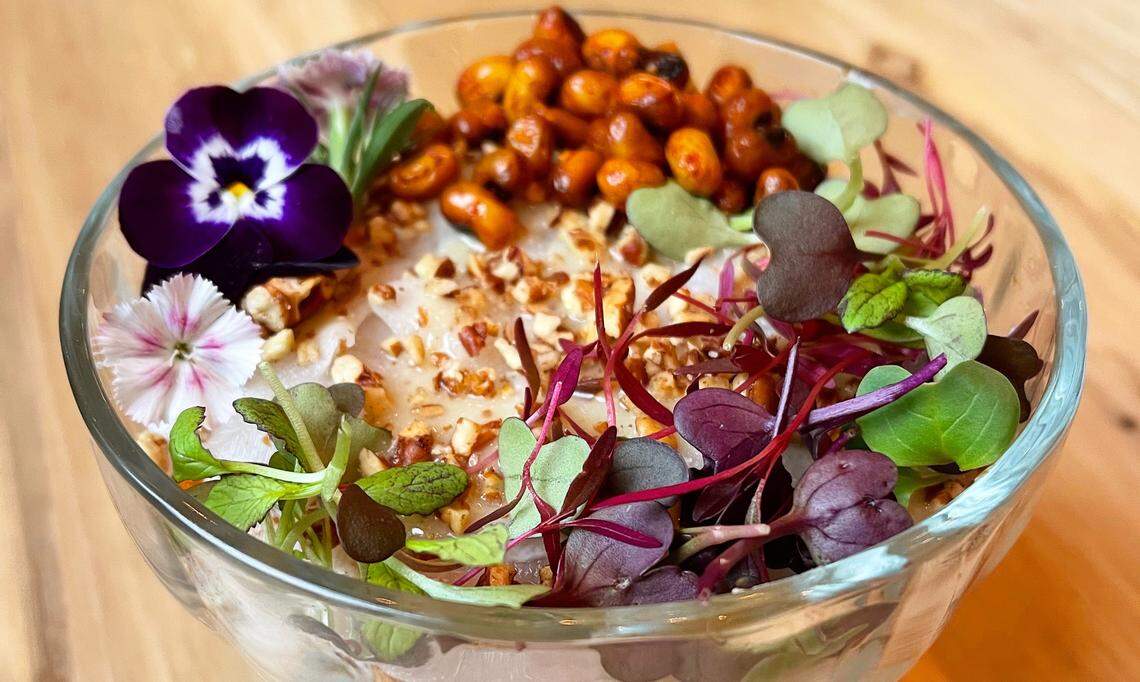 At Supperland, The Seven-Layer Salad includes local, seasonal FreshList vegetables, crunchy black-eyed peas, goat cheese and local herb-mustard vinaigrette.