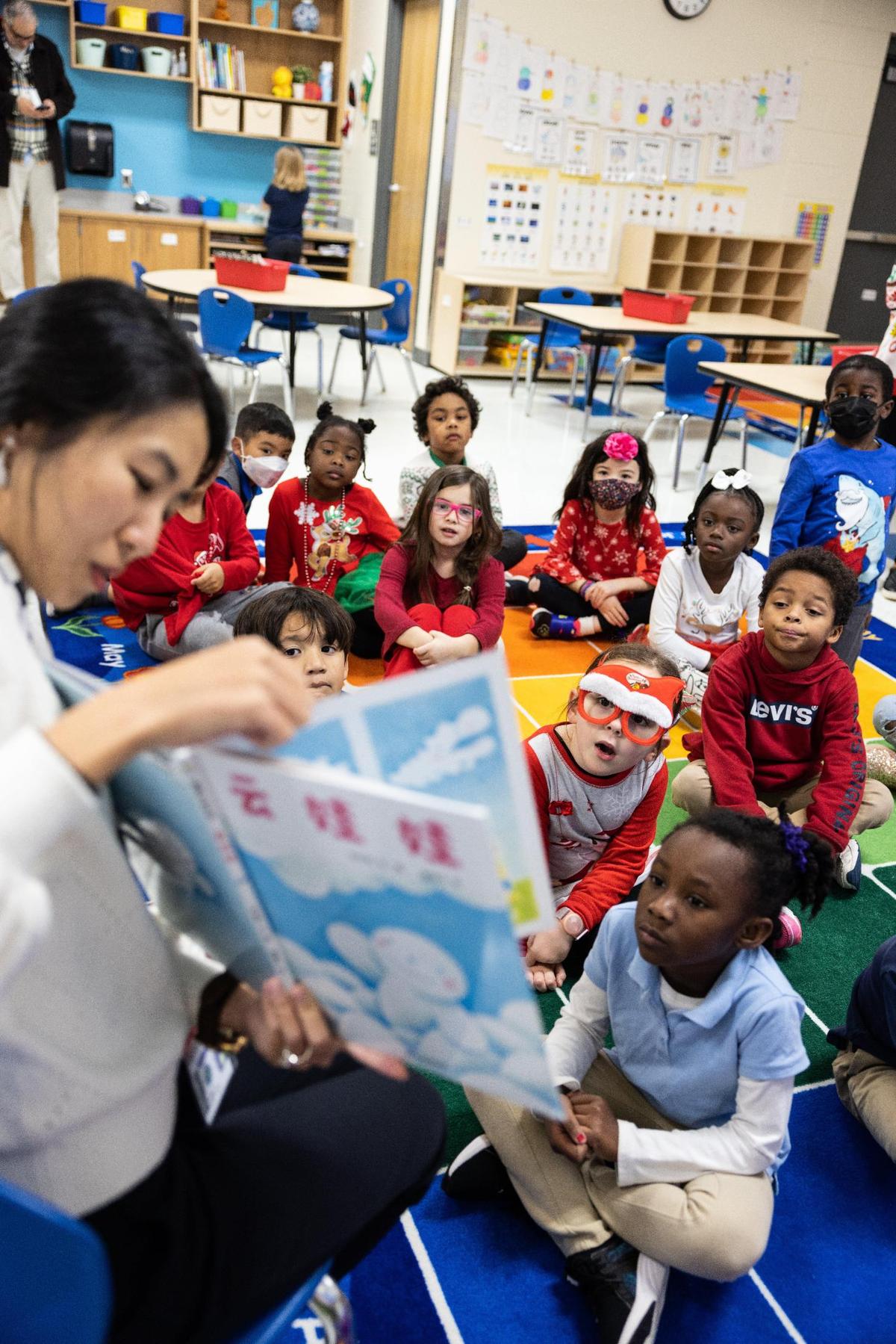 Students read in a Chinese immersion class at North Academy of World Languages in Huntersville, N.C., on Wednesday, December 14, 2022.