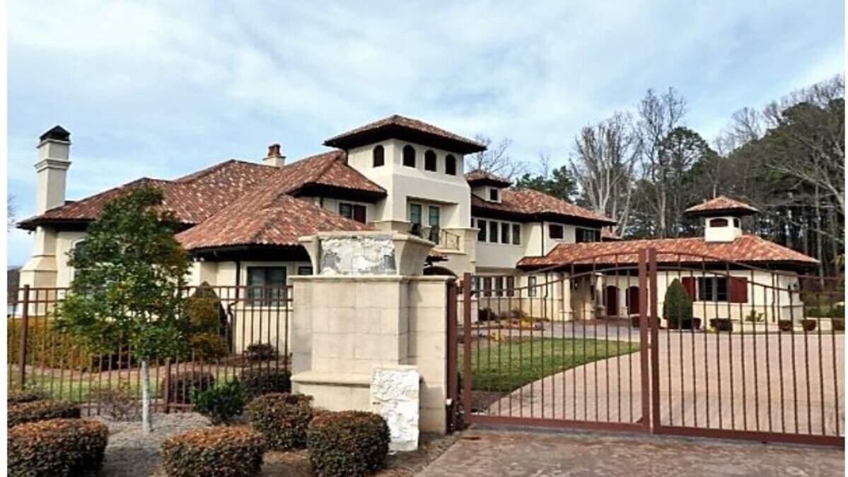 A family has temporarily withdrawn a plan to convert their two Lake Norman waterfront mansions into a venue for weddings and other events. One of the mansions is pictured here.
